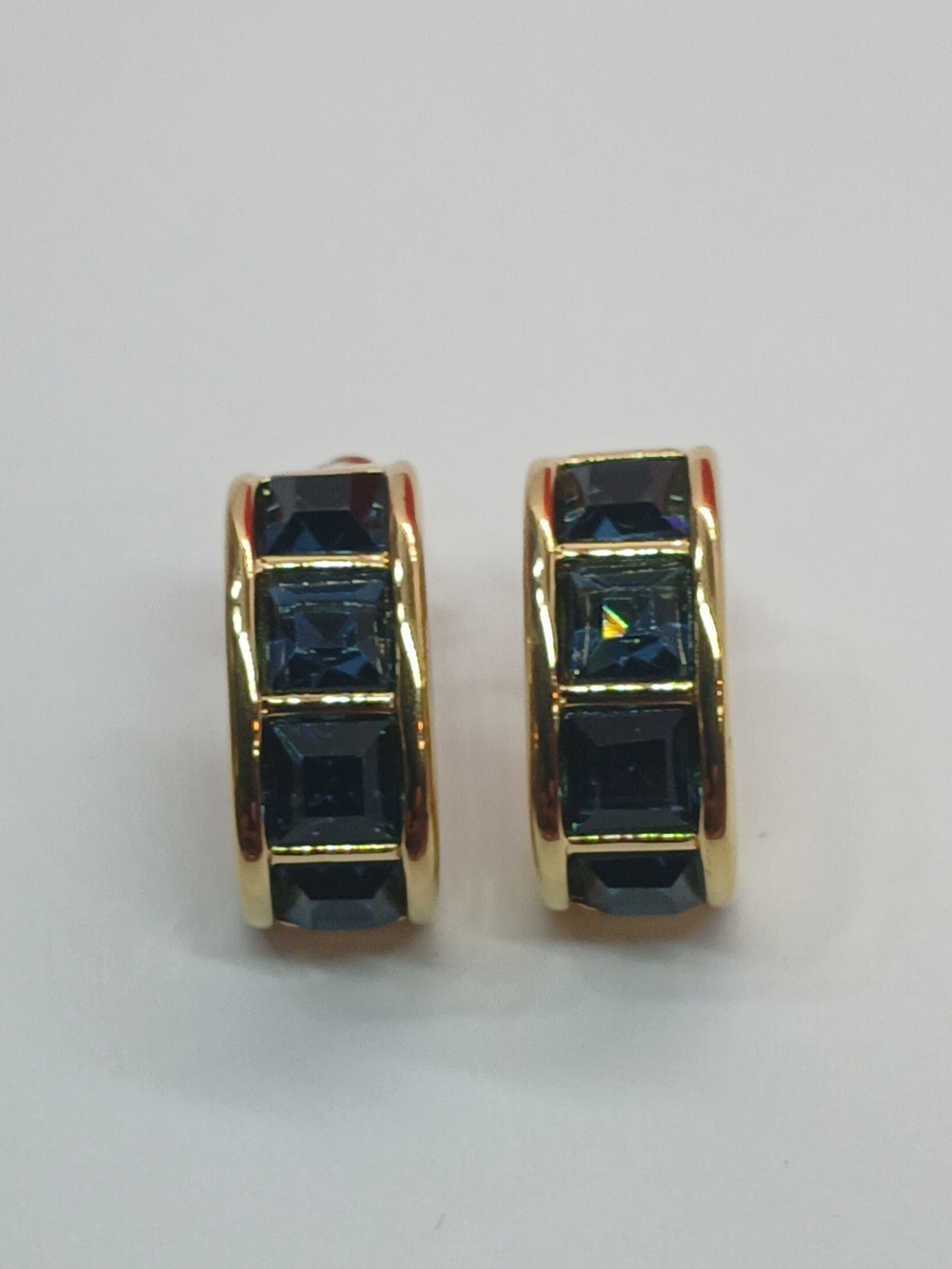 Swarovski Signed Gold-tone Huggie Earrings Channel-set Square Blue Crystals